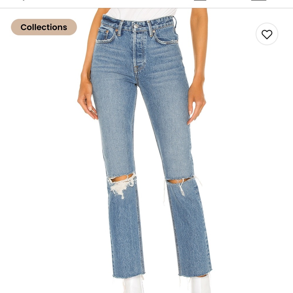 Perfectly distressed raw hem blue jean